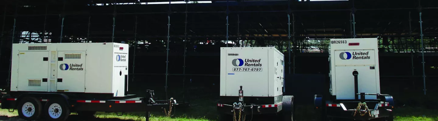 generators behind outdoor stage