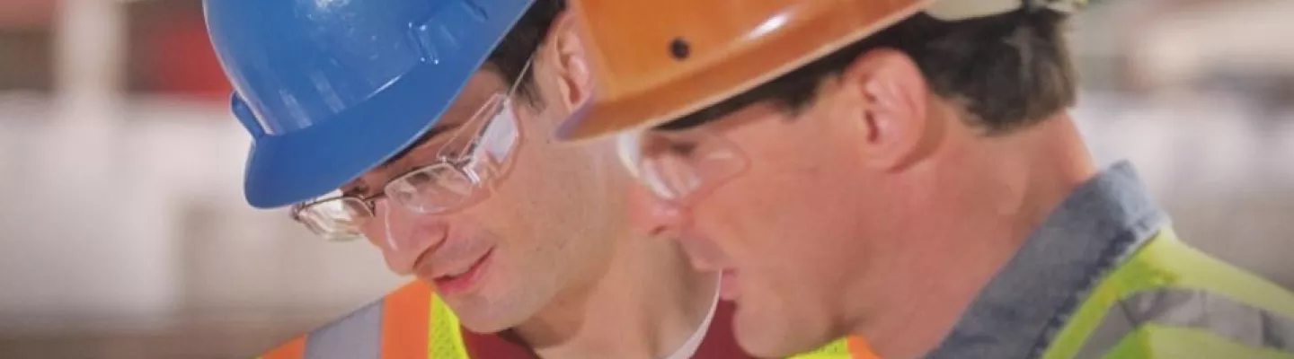 two men in hard hats