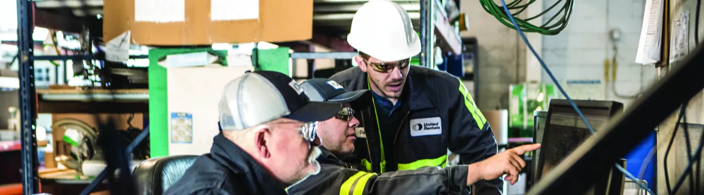 men in shop at united rentals
