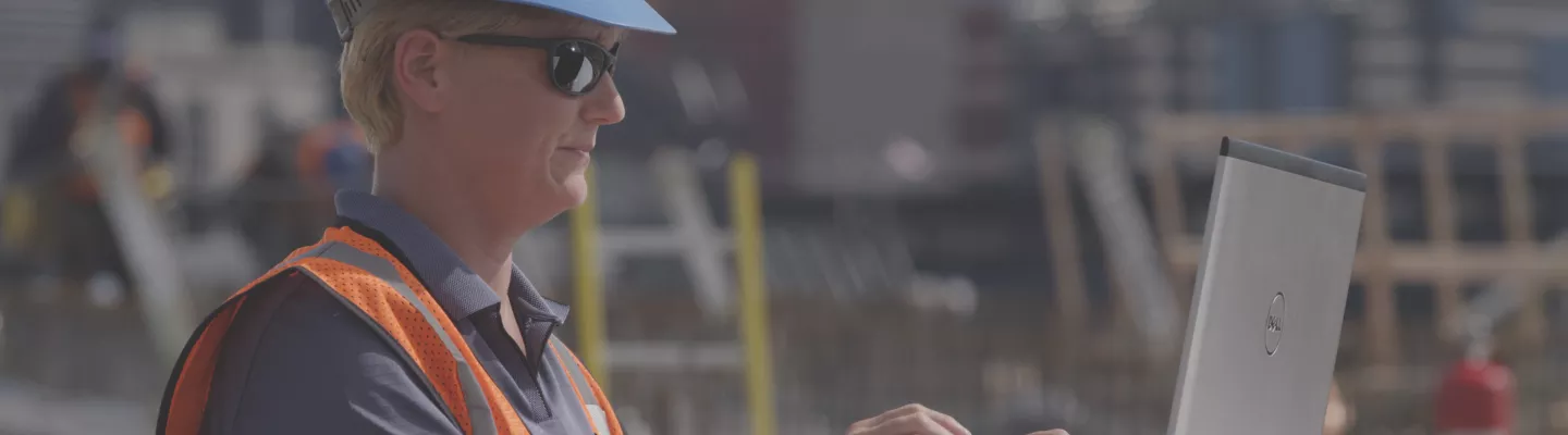 construction manager at computer