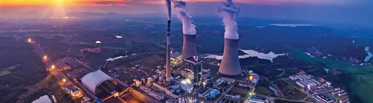 power plant at sunset