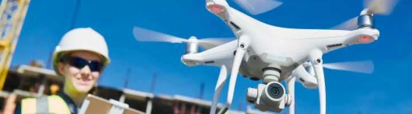 worker flying drone