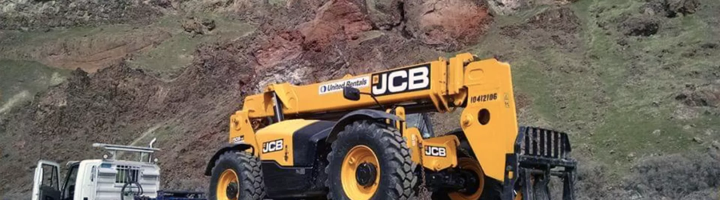 Forklift in front of the mountains