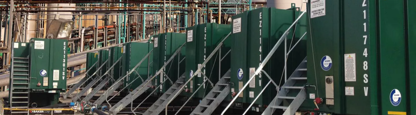 Row of green filtration tanks