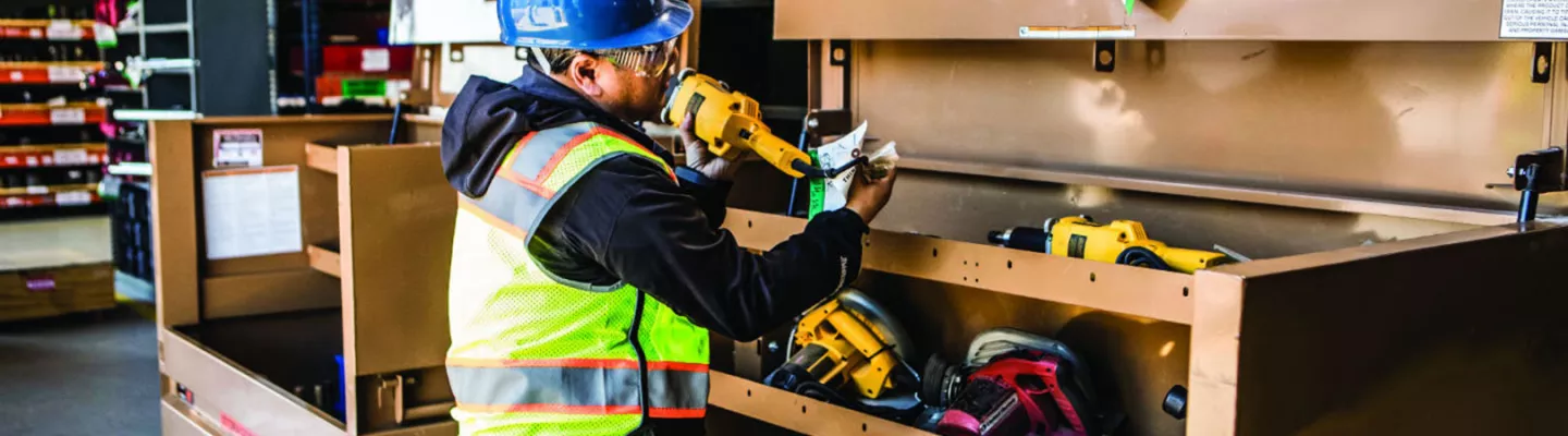 Worker using a power tool