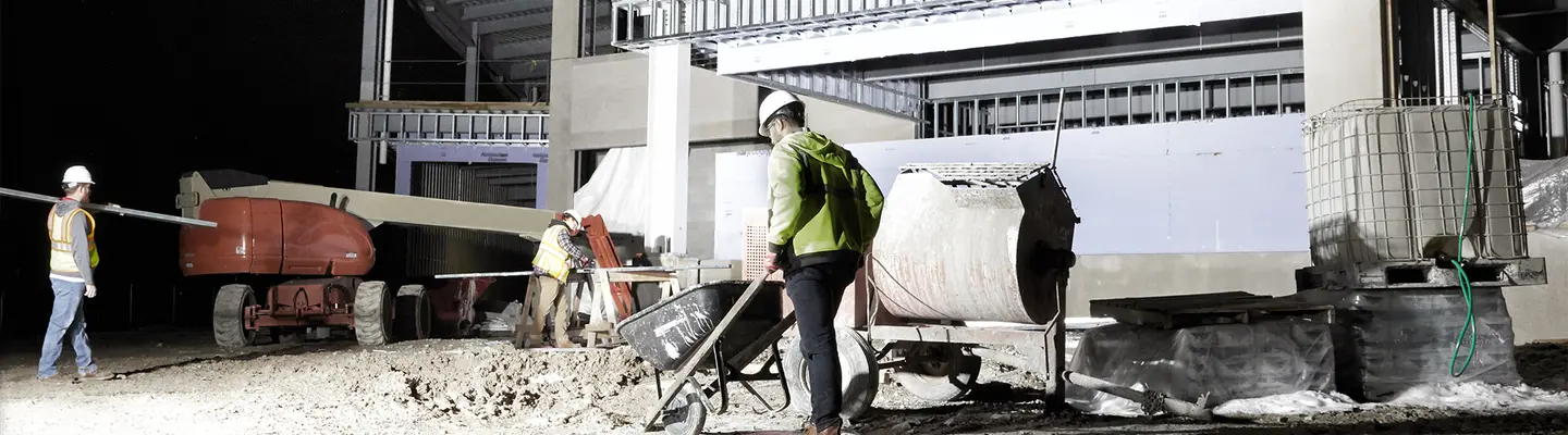 Light stand providing light on construction site