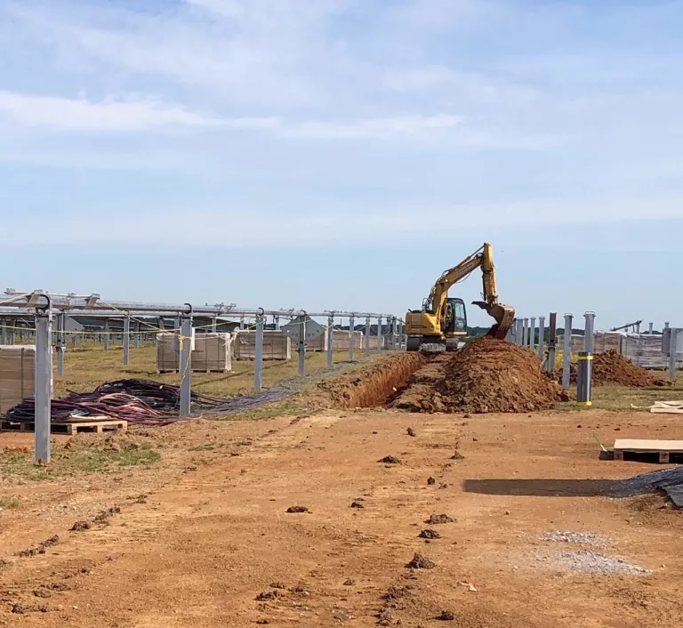 excavator on solar site 