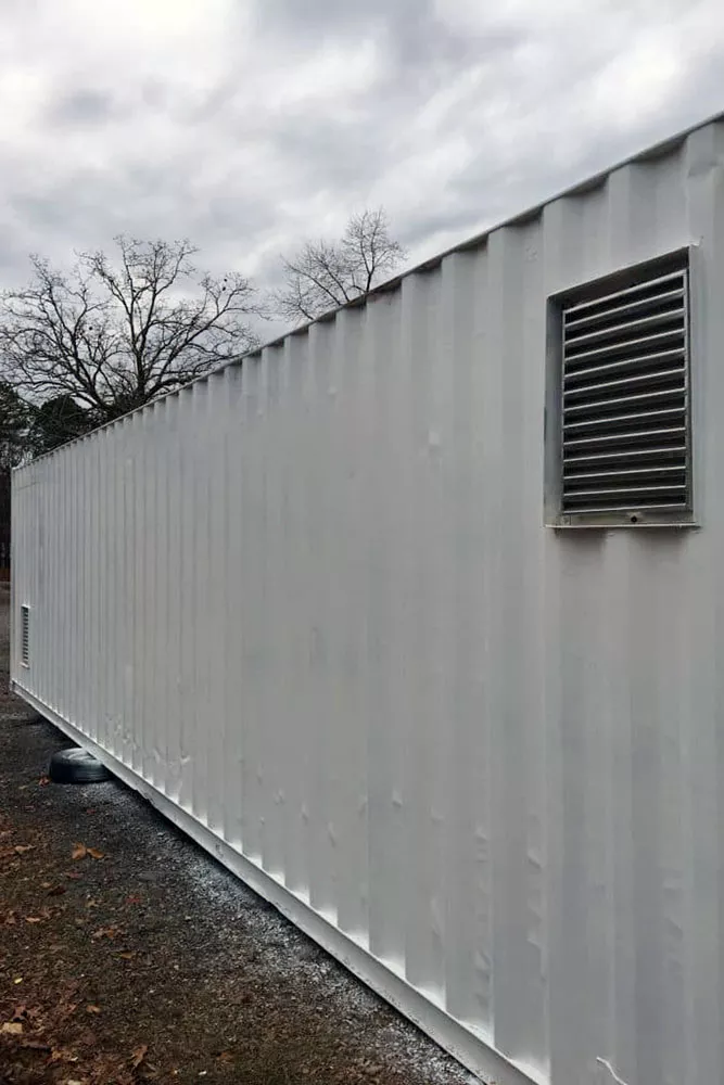 Container with mechanical rail system