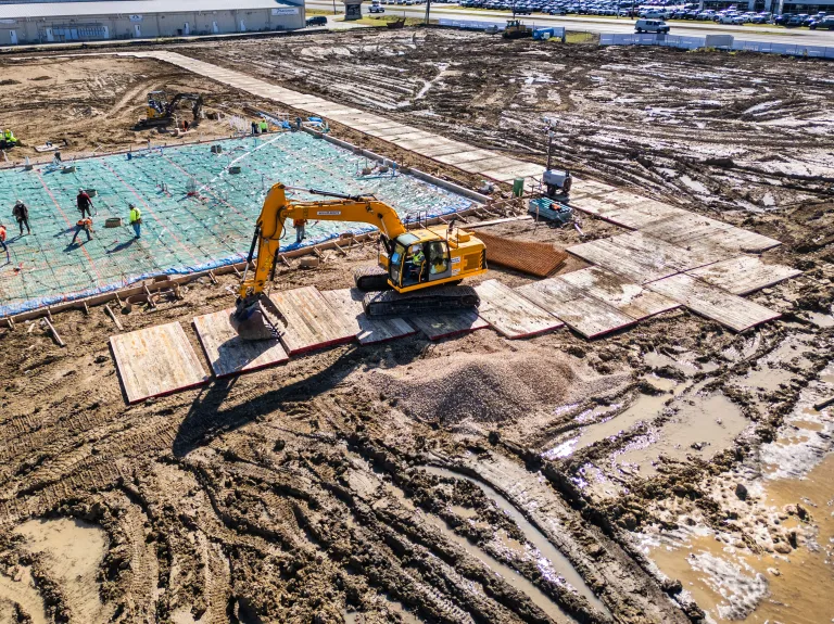 Ground Protection mats being installed at a job site