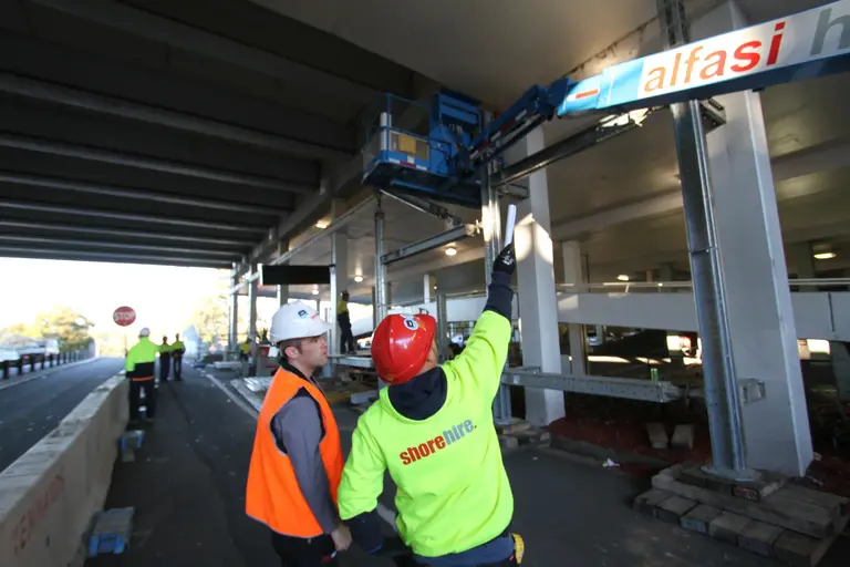 A Shore Hire engineer and product manager discussing a propping job on-site