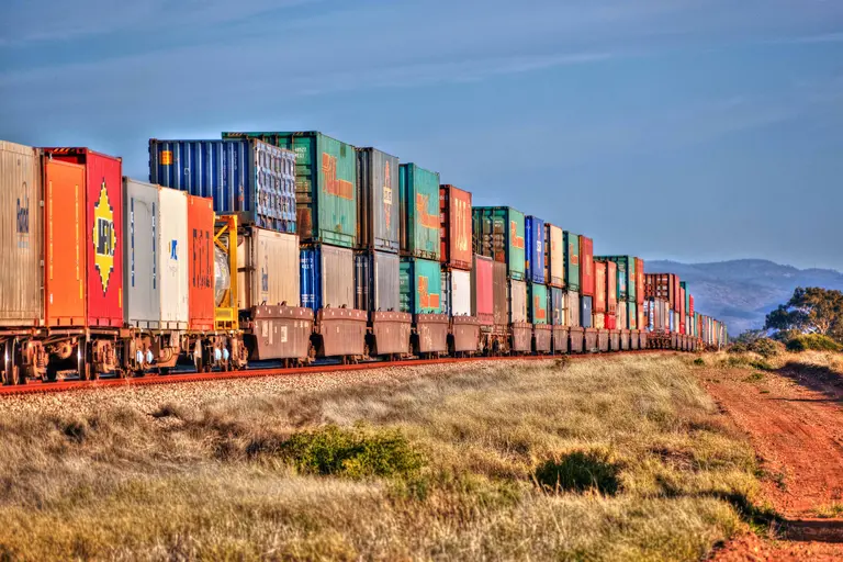 containers on a train in the bush Australia 