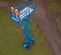 Above angled view of blue Genie scissor lift with two workers in the elevated platform on outdoor terrain.