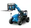 Front angled view of a blue Genie telehandler with extended boom and black fork attachment with an open cabin.