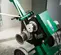 Green and black and silver GREENLINE Cable Puller, 6,500 lbs., Electric Powered