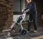 Green and silver MAKINEX Demolition Hammer Tile Stripping Cart, 35 lb. Weight Class