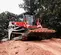 Red Takeuchi Compact Track Loader