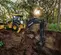 Yellow John Deere backhoe loader