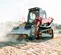 Red, white and black Takeuchi 2,900 lb. high flow Compact Track Loader