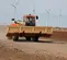 Orange and beige telehandler