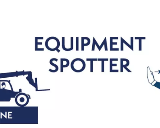 equipment spotter, construction worker holding up hand signal 