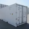 Exterior cargo doors on a white refrigerated shipping container