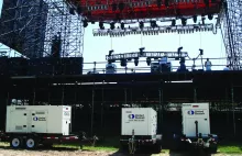 generators behind outdoor stage