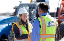 man and woman in ppe on jobsite