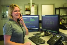 woman on phone at united rentals branch