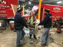 Patty Vitale speaks with workers