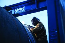 Welder works in confined space