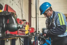 Worker using tools